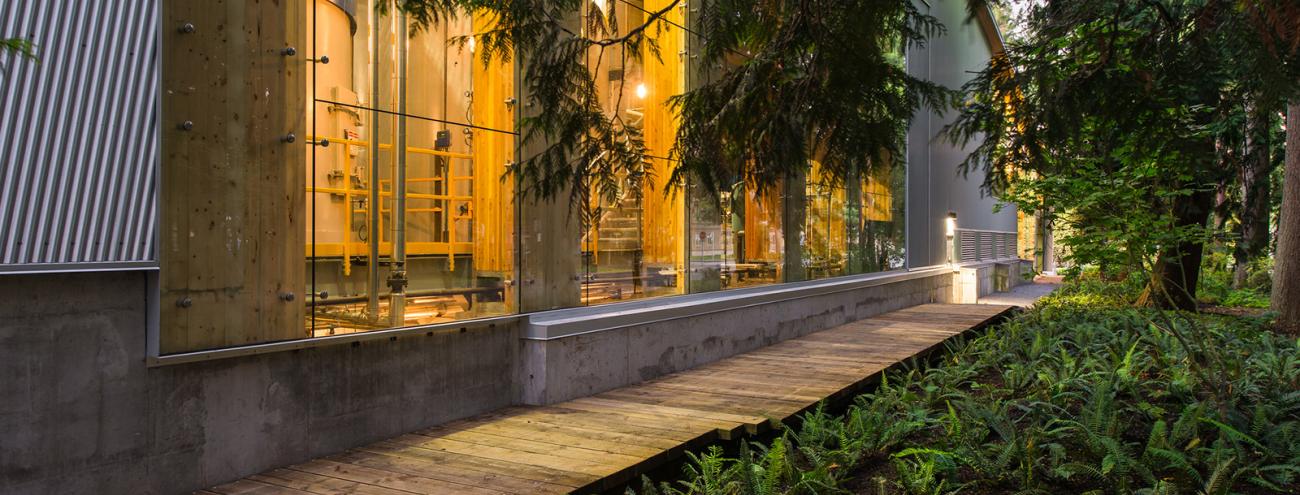 A mass timber building with locally-fabricated CLT panels houses the facility.